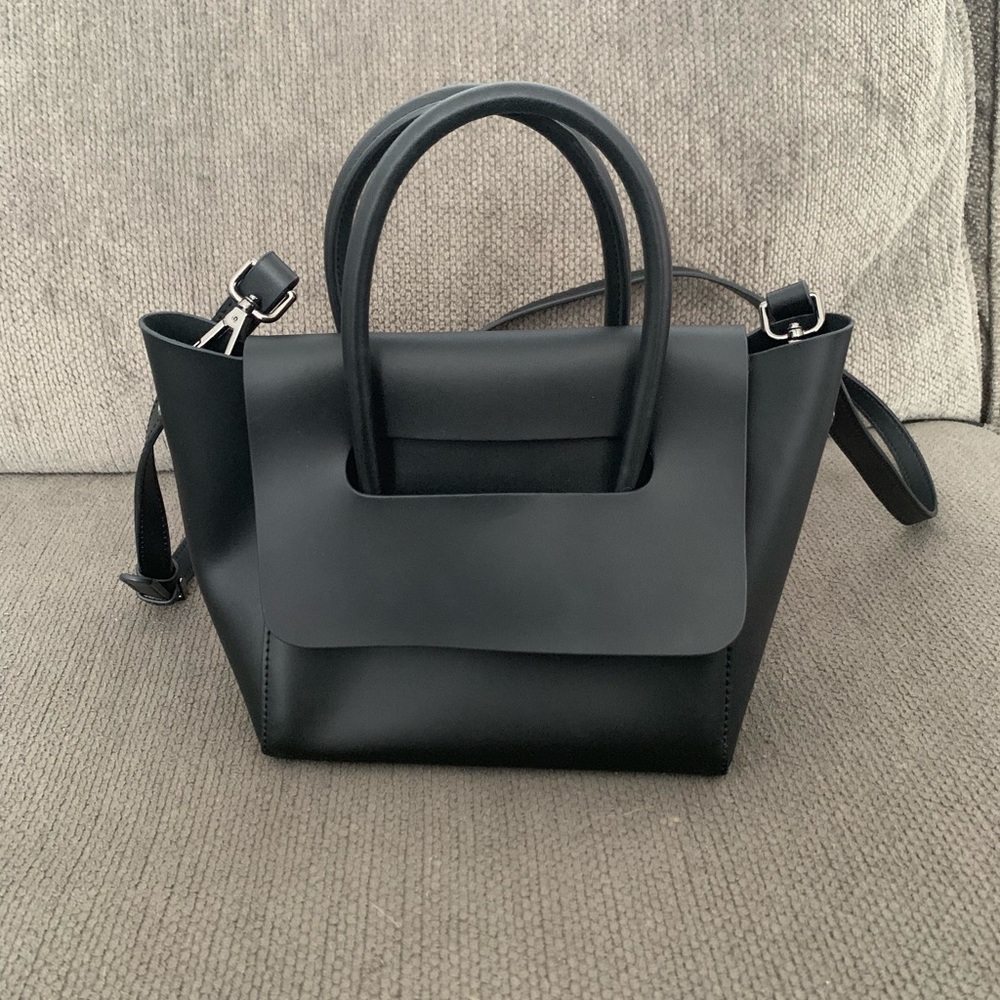 hieleven flap closure handbag